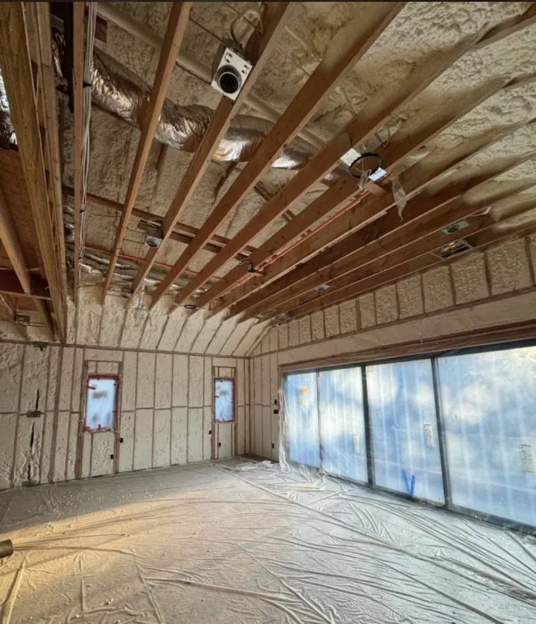 Interior walls and ceiling insulated with spray foam during new construction in Albert Lea